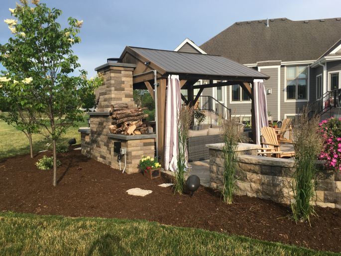 Mequon mulch installation and tree planting job